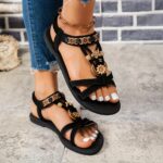 ⁦Women'S Black Flat Sandals with Golden Floral Accents - Open Toe, Synthetic Upper, Non-Slip Sole, Casual Footwear|Decorative Sandals|Synthetic Sandals⁩ - الصورة ⁦5⁩