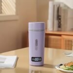 ⁦Smart Mini Electric Water Bottle - Portable & Safe with Auto Shut-Off, Easy-Clean Separable Cord for Home, Business Trips & Travel Use⁩ - الصورة ⁦2⁩