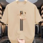 ⁦Men's Casual Calvin Print T-Shirt - Black with Golden Stripe Design, Comfortable Polyester Crew Neck Tee for Everyday Streetwear, Summer Essential⁩ - الصورة ⁦13⁩