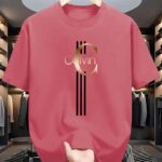 ⁦Men's Casual Calvin Print T-Shirt - Black with Golden Stripe Design, Comfortable Polyester Crew Neck Tee for Everyday Streetwear, Summer Essential⁩ - الصورة ⁦20⁩