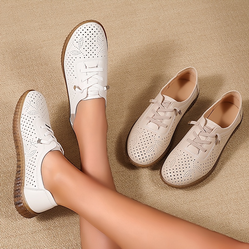 37f9af48-990a-45ad-a7de-e2af268fbff5.jpg Breathable Women's Faux Cover Flats with Elastic Lace-Up Closure - Versatile Solid Color, Round Toe Design for All Seasons - الصورة 1
