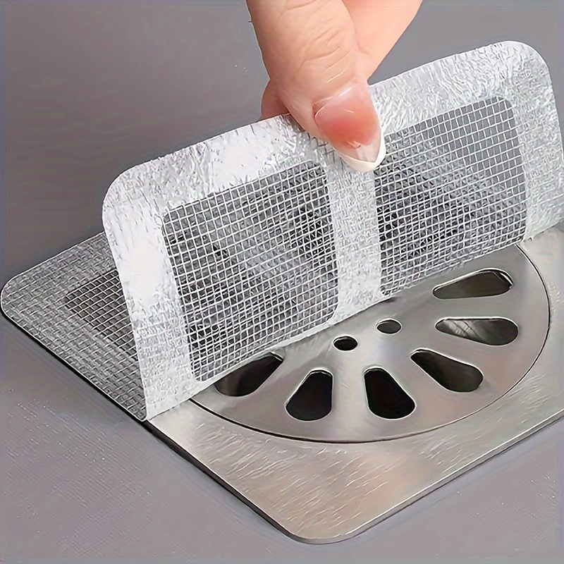 3d7a03be-73bc-41ab-8964-578830272169.jpg 10pcs bathroom hair filter hair screen Toilet sewer filter Kitchen anti-clogging anti-insect self-adhesive floor drain sticker. - الصورة 1