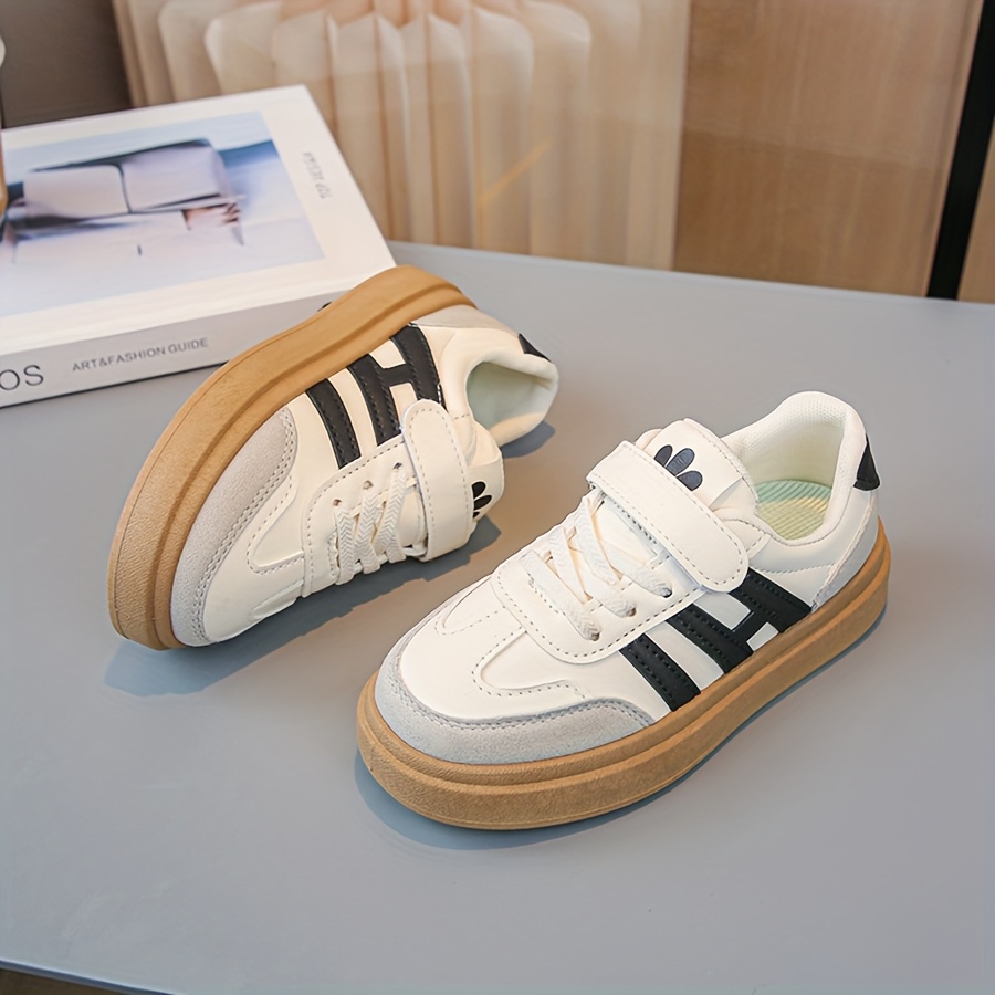 3fa3e5b0-3911-49d1-b94a-4eb5a372a5bd.jpg 1 pair of Youngsters's spring and autumn new sports shoes, soft soled board shoes for boys and girls, versatile white shoes for girls - الصورة 1