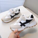 ⁦Stylish Beige & Black Sneakers with Easy Closure Straps, Round Toe, Low Top Design for Running and Daily Wear, Preppy Style, Tpr Sole, Casual Athletic Shoes | Stylish Athletic Shoes | Easy Closure Strap Sneakers⁩ - الصورة ⁦3⁩