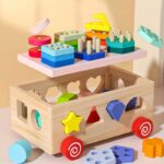 ⁦This Early Education Toy Vehicle for Boys And Girls Offers Geometric Play, Blocks for Pushing, a Colorful Set of Intelligence Blocks, Shape Matching, And Classification, Allowing Youngsters to Develop Cognitive Skills And Exercise Hand-Eye Coordination.⁩ - الصورة ⁦2⁩