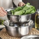 ⁦A Set of Three Stainless Steel Kitchen Tools, Including an Integrated Grinder, a Multifunctional Strainer, And a Mixing Bowl - Perfect for Cleaning And Slicing Fruits, Vegetables, And Cheese | Food-Safe with a Drainage System, Ideal for Home Cooking And K⁩ - الصورة ⁦8⁩