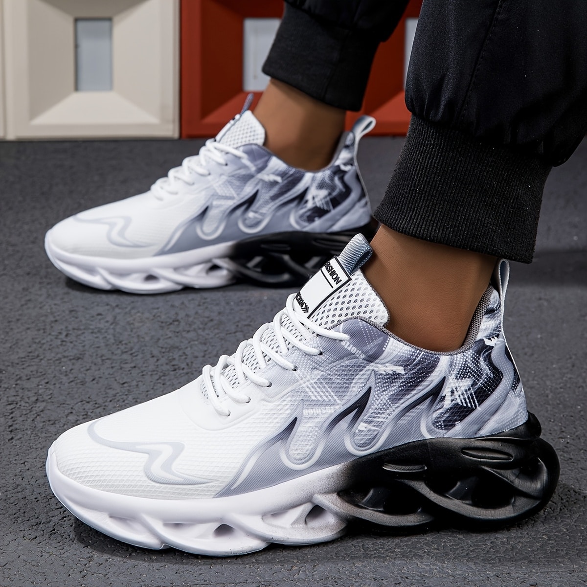 5d548b0d-0dbc-495e-93b0-78a53f3975e9.jpg Men's Breathable Athletic Sneakers - Non-Slip, Stylish Black & White Gradient Geometric Design, Comfortable Casual Shoes with Elastic Sole for Casual Attire - Image 1