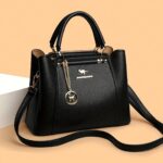 ⁦Women's Stylish Black Handbag with Golden-Tone Hardware & Detachable Shoulder Strap - High Quality, Lightweight, and Elegant Design for Everyday Use, Designer Handbags⁩ - الصورة ⁦9⁩