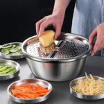 ⁦A Set of Three Stainless Steel Kitchen Tools, Including an Integrated Grinder, a Multifunctional Strainer, And a Mixing Bowl - Perfect for Cleaning And Slicing Fruits, Vegetables, And Cheese | Food-Safe with a Drainage System, Ideal for Home Cooking And K⁩ - الصورة ⁦6⁩