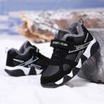 ⁦Boys' Winter Snow Boots with Warm Plush Lining - Comfy Non-Slip Soft Sole Sneakers, Black & White Geometric Design, Hook and Loop Closure, Casual Retro Style for Youngsters, Winter Boots⁩ - الصورة ⁦6⁩