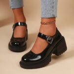 ⁦Women's Glossy Black Mary Jane Shoes with Thick Platform Heel, Adjustable Buckle Strap & Round Toe - Synthetic Cover Upper & Durable Rubber Sole for All-Season Comfort, Modern Footwear⁩ - الصورة ⁦3⁩