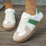 ⁦Women's Retro Style Sneakers - Lightweight PU Cover Low-Top Lace-Up Shoes with White & Green Color Scheme, Beige Sole, and Comfortable Fabric Inner Lining for Casual Attire⁩ - الصورة ⁦3⁩