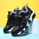 ⁦Boys' Winter Snow Boots with Warm Plush Lining - Comfy Non-Slip Soft Sole Sneakers, Black & White Geometric Design, Hook and Loop Closure, Casual Retro Style for Youngsters, Winter Boots⁩ - الصورة ⁦2⁩