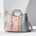 ⁦2024 New Women's Color-Block Tote Bag with Adjustable Crossbody/Shoulder Strap, Golden-Tone Hardware & Magnetic Closure - High Quality Casual Handbag for Commuting, Work, Travel - Navy/Beige/White Contrast Design, Crossbody Purse, Commuting Accessory, Dur⁩ - الصورة ⁦4⁩
