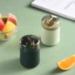 ⁦Automatic Pop-Up Toothpick Holder – Easy Press, Convenient Home & Restaurant Use, Green Plastic with Golden Accents, Transparent Lid, Stylish and Functional Toothpick Dispenser⁩ - الصورة ⁦4⁩