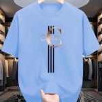 ⁦Men's Casual Calvin Print T-Shirt - Black with Golden Stripe Design, Comfortable Polyester Crew Neck Tee for Everyday Streetwear, Summer Essential⁩ - الصورة ⁦18⁩