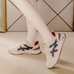 ⁦Women's Lightweight Running Sneakers - Casual Low-Top Lace-Up Shoes with Soft Non-Slip Rubber Sole, Beige with Blue & Red Stripes, Lightweight & Comfortable for All-Day Wear⁩ - الصورة ⁦6⁩