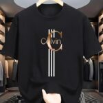 ⁦Men's Casual Calvin Print T-Shirt - Black with Golden Stripe Design, Comfortable Polyester Crew Neck Tee for Everyday Streetwear, Summer Essential⁩ - الصورة ⁦11⁩