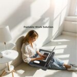 ⁦Laptop lap stand, portable laptop table, lap pad tray with wrist rest, mouse pad, tablet and phone slots, portable handle, cushion⁩ - الصورة ⁦8⁩