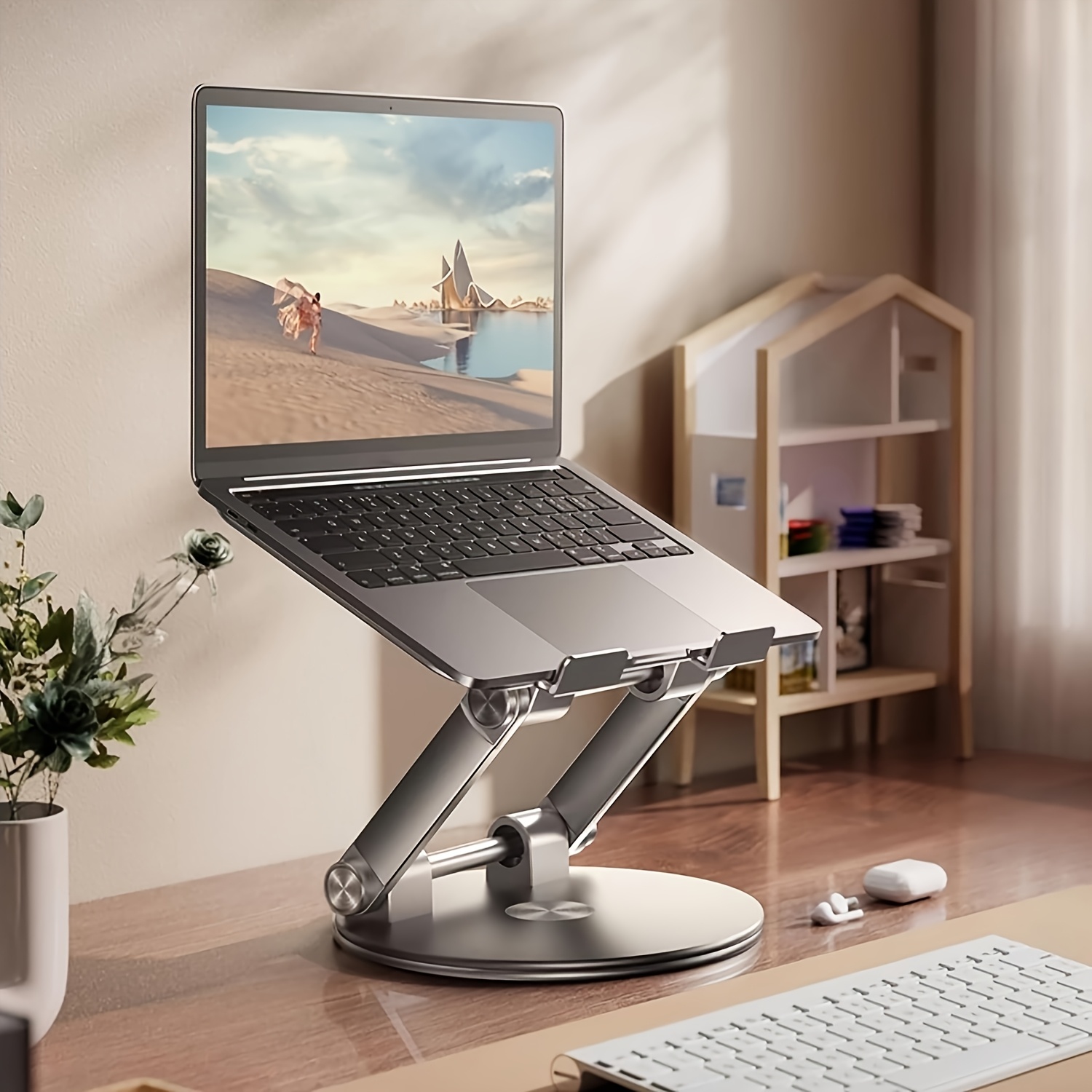 397e4b71-7610-4a9b-8fdb-17f68e31776d.jpg Ergonomic Adjustable Laptop Stand with 360° Swivel Base, Foldable Aluminum Alloy Design for MacBook Pro/Air & 25.4-43.94 cm Laptops, Adjustable Height up to 360° Rotation, Portable & Collapsible for Easy Storage - Image 1