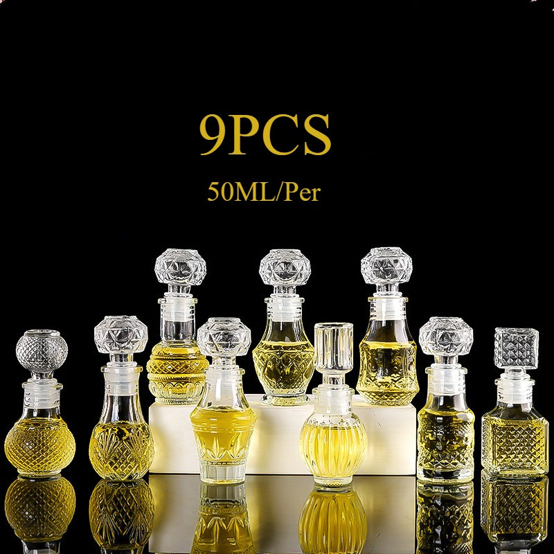 a068e9d7e68e41c9a72e96c71172f4d6-goods.jpeg 50ml/1.7oz capacity 9pcs set of transparent glass essential oil perfume portioning bottles, engraved and decorated perfume containers with sealed LIDS, suitable for home decoration and gifts, odorless and refillable - الصورة 1