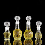 ⁦50ml/1.7oz capacity 9pcs set of transparent glass essential oil perfume portioning bottles, engraved and decorated perfume containers with sealed LIDS, suitable for home decoration and gifts, odorless and refillable⁩ - الصورة ⁦2⁩