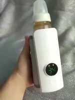 ⁦Wireless Portable Bottle Warmer for Travel - Rechargeable 6000mAh, LCD Display, USB Charging, Easy On-The-Go Heating Solution, Constant Temperature, Perfect for On-the-Go Parents⁩ - الصورة ⁦9⁩